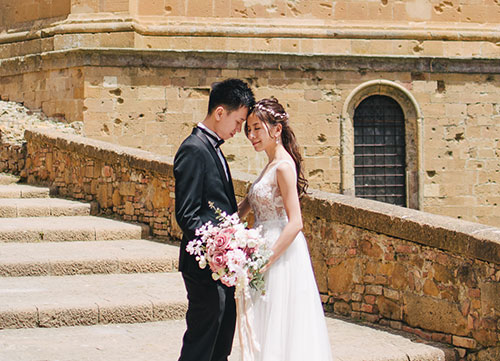 bride and groom posing at montalto castle